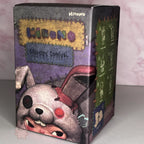 Hirono-monsters-carnival Box with cartoon dog illustration and 'Hirono' branding on a gray background