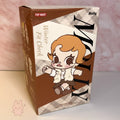 Baby Molly - Winter Fit Check Product packaging with a cartoon character on a checkered background