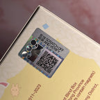POPBEAN fluffy and cozy Scratch-off verification card with QR code on a product packaging