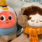 POPBEAN fluffy and cozy Two plush toys with colorful scarves against a glittery background