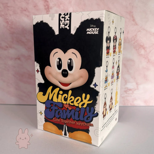 Mickey Mouse keychain box with character design on a pink background