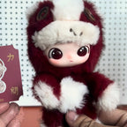 Pop-Mart-Have-a-good-run Stuffed toy in a red and white outfit held by a person against a checkered background