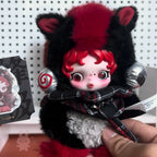 Pop-Mart-Have-a-good-run Plush toy with black and red design, held by a hand against a white pegboard background.