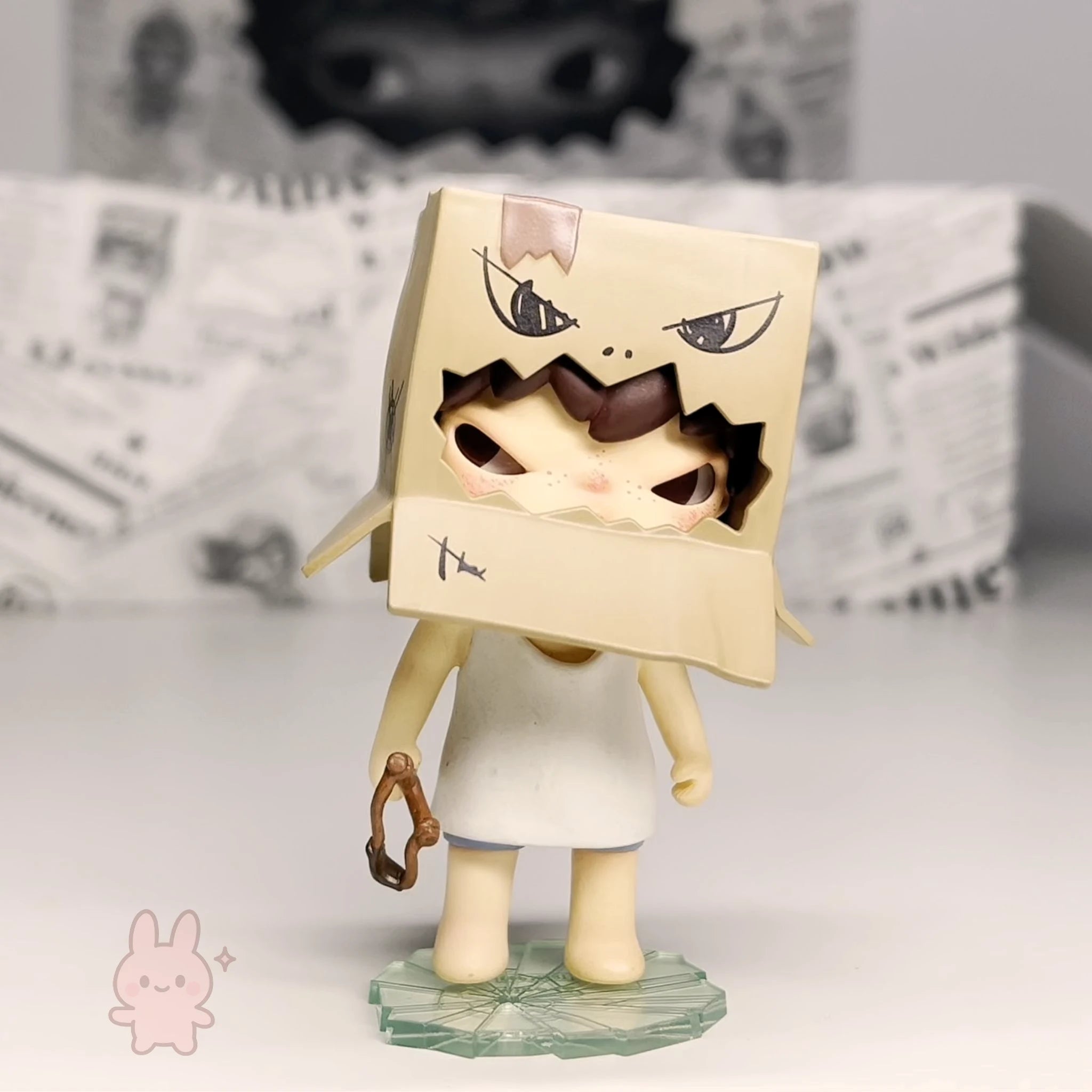 Pop Mart Hirono Little Mischief Animated character with a box for a head on a light gray background