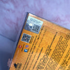 Pop Mart Labubu Halloween Product packaging with QR codes and text on a textured surface