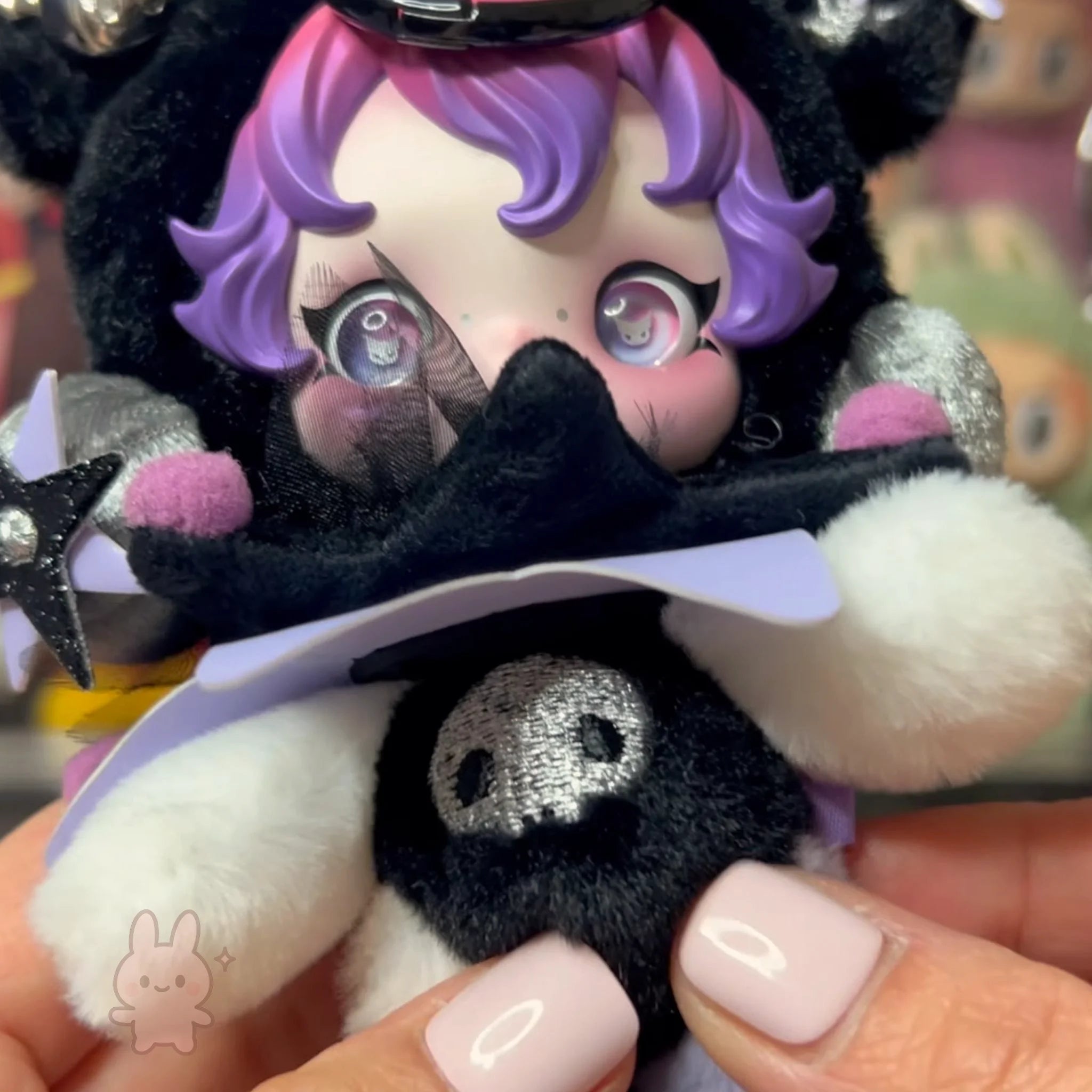 SKULLPANDA KUROMI Plush toy with cartoon character design held by a person