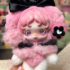 Skullpanda x My Melody Plush toy with pink hair and outfit, held in a hand.