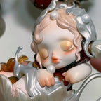 Skullpanda-the-feast-begins Close-up of a detailed figurine with a soft expression on a neutral background