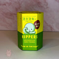 SMISKI Box of Hippers decorative mini figures with a cartoon character on a pink background