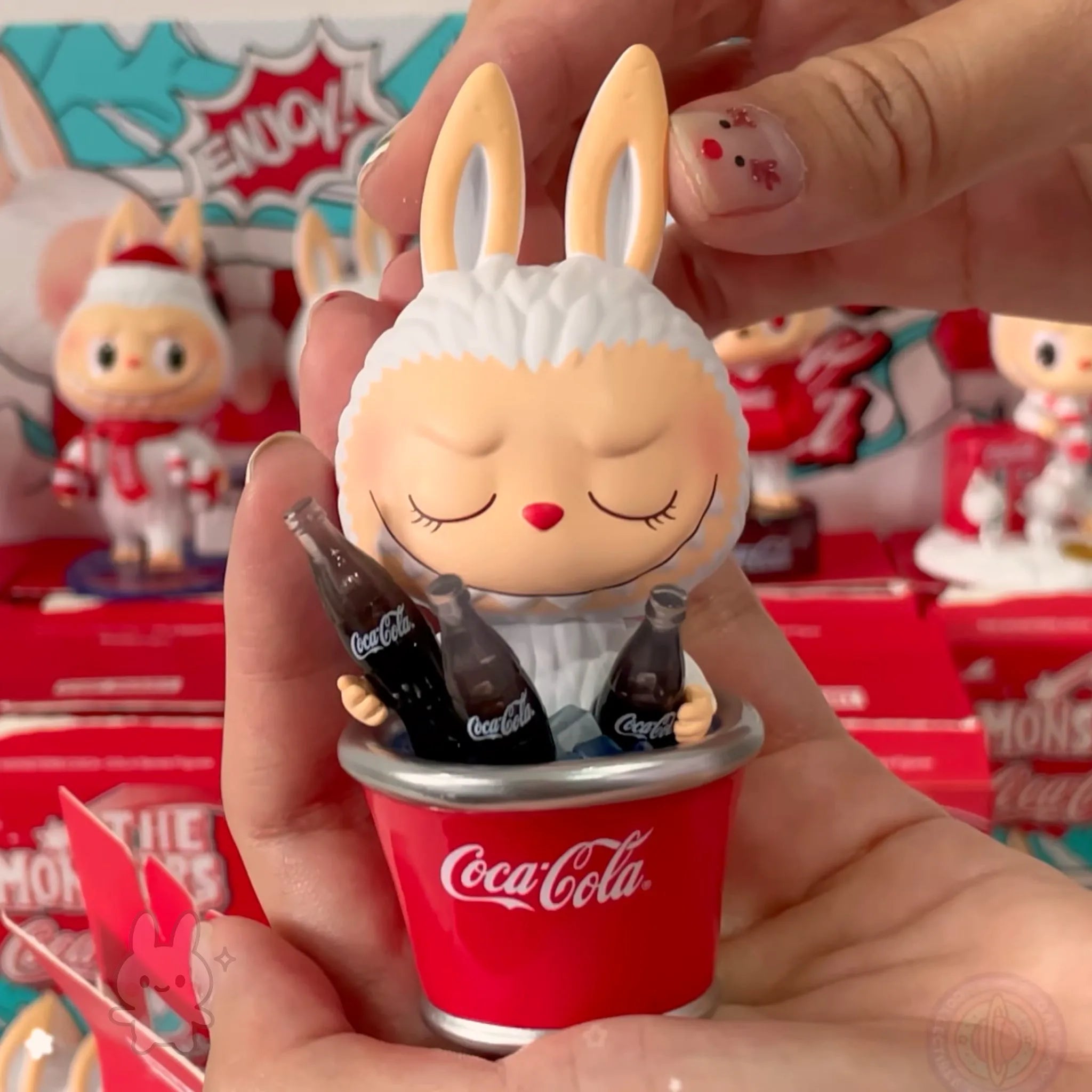 The Monsters Coca-Cola Figurine of a character holding Coca-Cola bottles in a cup, with Coca-Cola branding visible.