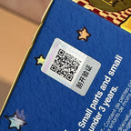 Twinkle Twinkle Be a Little Star QR code on a blue surface with stars and text