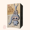 Box packaging for 'Pin for Love' vinyl plush pendant with cartoon character design.