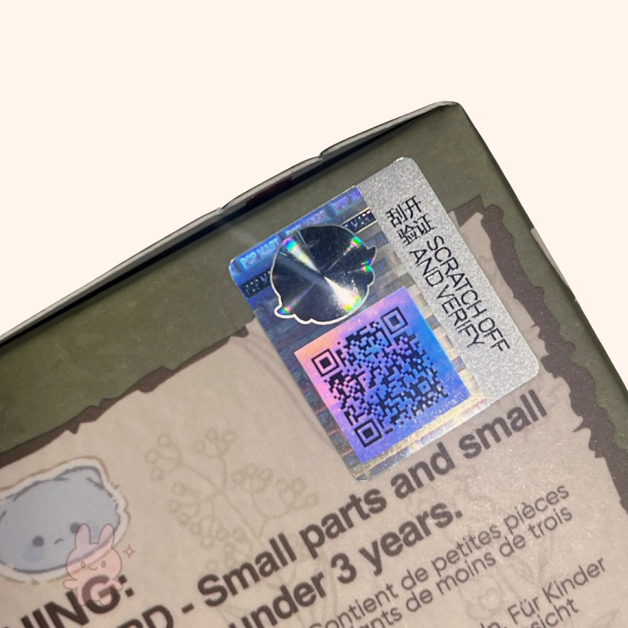 dimoo-the-missing-day Product with a scratch-off security label and QR code on a white background