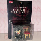 Hirono Dead Silence figurine in packaging with Pop Mart branding on a pink background