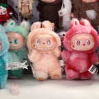labubu-big-into-energy Plush toys with cartoonish designs in various colors on a white background