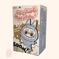 Box of 'Exciting Macaron The Monsters' vinyl figure with cartoon character design.