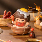 PUCKY egg-topped clay-pot figure
