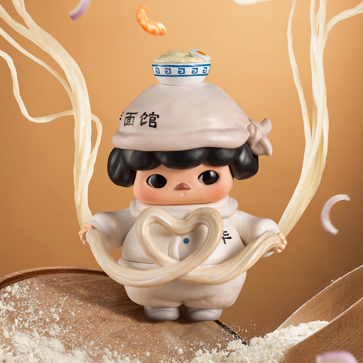 PUCKY noodle-chef figure
