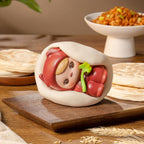 PUCKY stuffed-bun figure on a cutting board