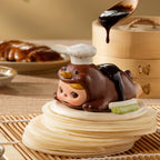 PUCKY sauce figure on a plate of noodles
