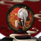 Black and red SKULLPANDA Mirage figure with gold details