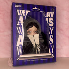 Toy figure in a box with 'Skullpanda Wednesday' branding on a pink background