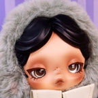 skullpanda Close-up of a doll with a fur-lined hood and floral details on a light purple background