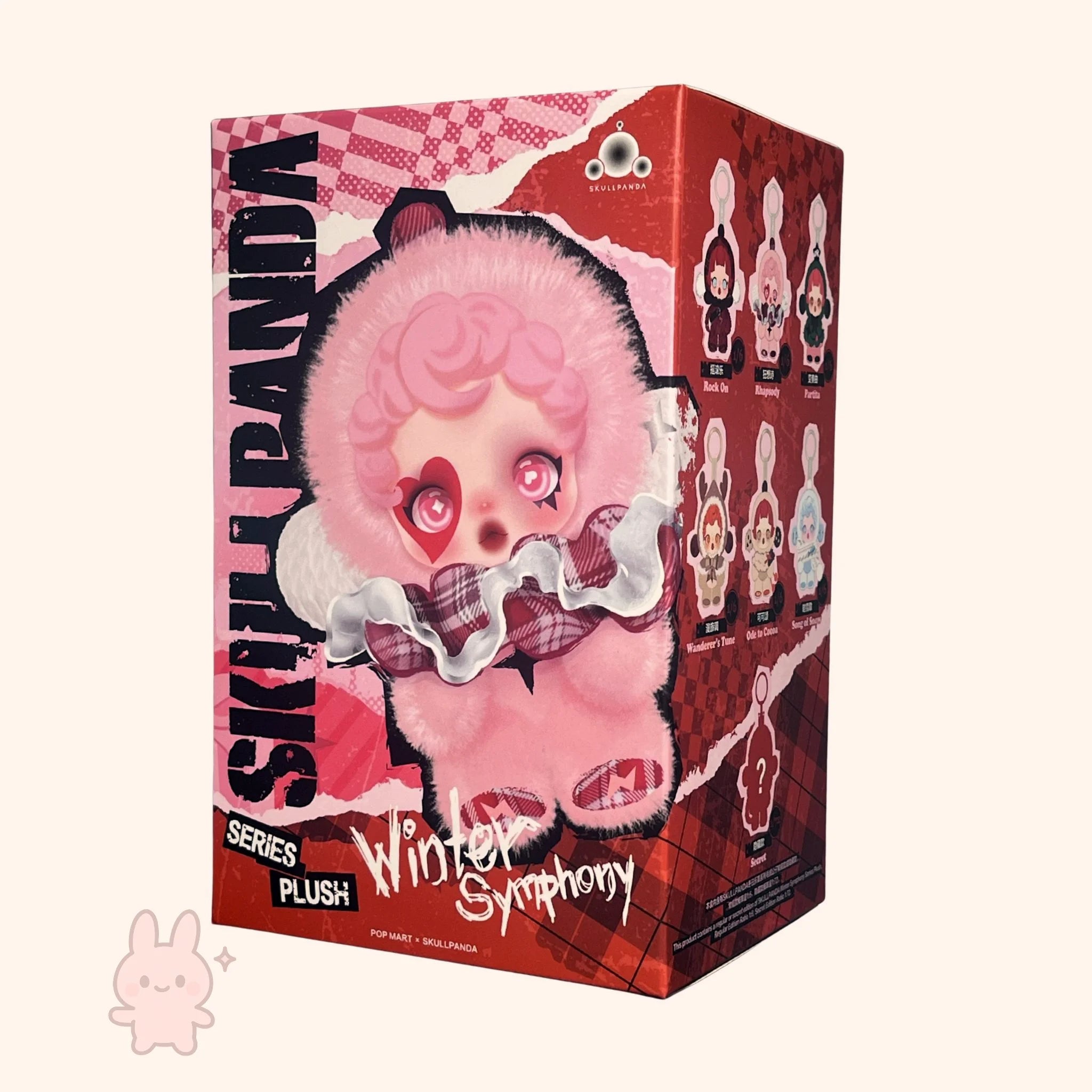 skullpanda Pink plush toy with plaid accents in a decorative box packaging on a white background