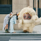 White You Found Me plush character in a city scene