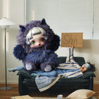 Purple You Found Me plush character holding a Shh sign