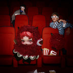 Red You Found Me plush character in a cinema
