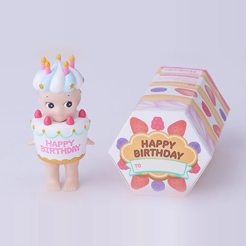 Sonny Angel Birthday Gift Series Strawberry Shortcake figure next to its Happy Birthday cake gift box