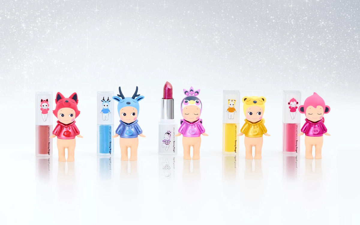 Sonny Angel x shu uemura Makeup Angel Series lineup of five figures beside shu uemura cosmetics