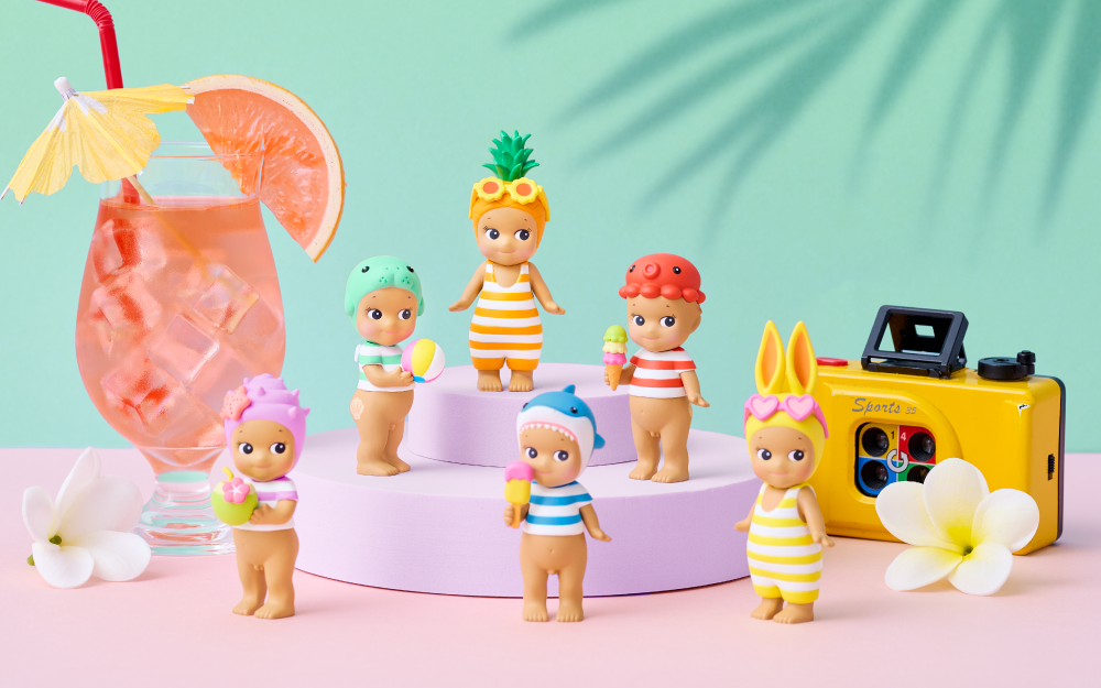 Sonny Angel Summer Vacation Sun-Kissed Style figures in a summer display
