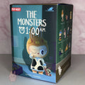 the-monster-1am-series Box packaging of 'The Monsters 1:00 AM' by Pop Mart with character illustration on a light pink background.