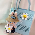 Labubu  Keychain with cartoon character wearing a hat and holding flowers, against a light blue background.