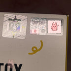 shinchan QR validate Stickers on a product with visible branding
