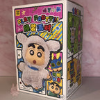 shinchan Toy packaging with cartoon character and colorful design on a pink background