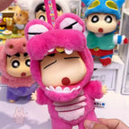 shinchan Plush toy character in a pink outfit with a blurred background of other toys