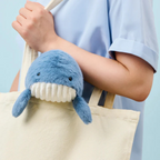 Posture Pal Whale beside a bag